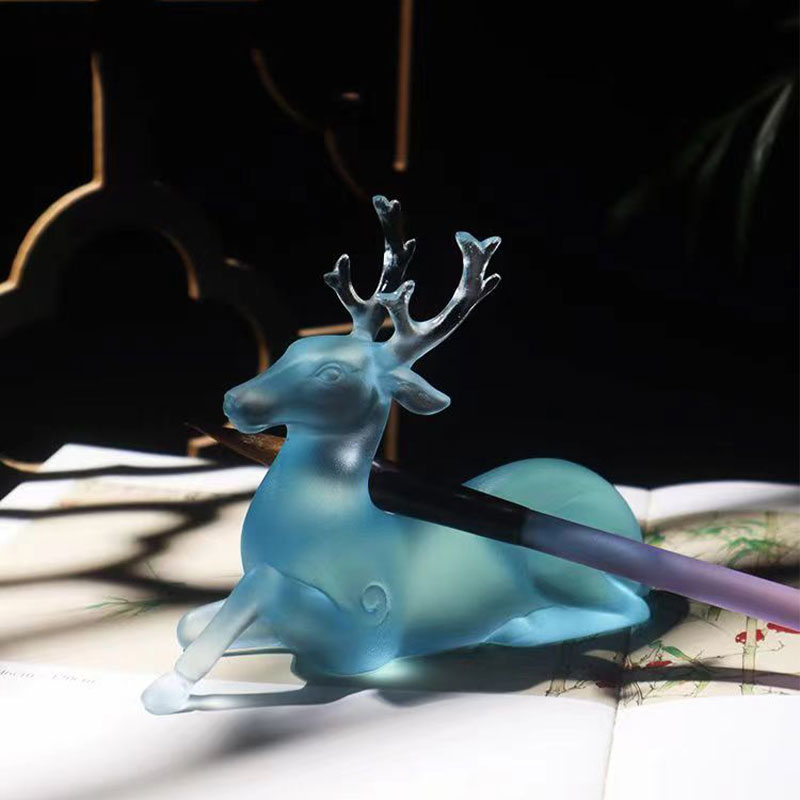 Modrý skleněný držák na kartáč ve tvaru jelena